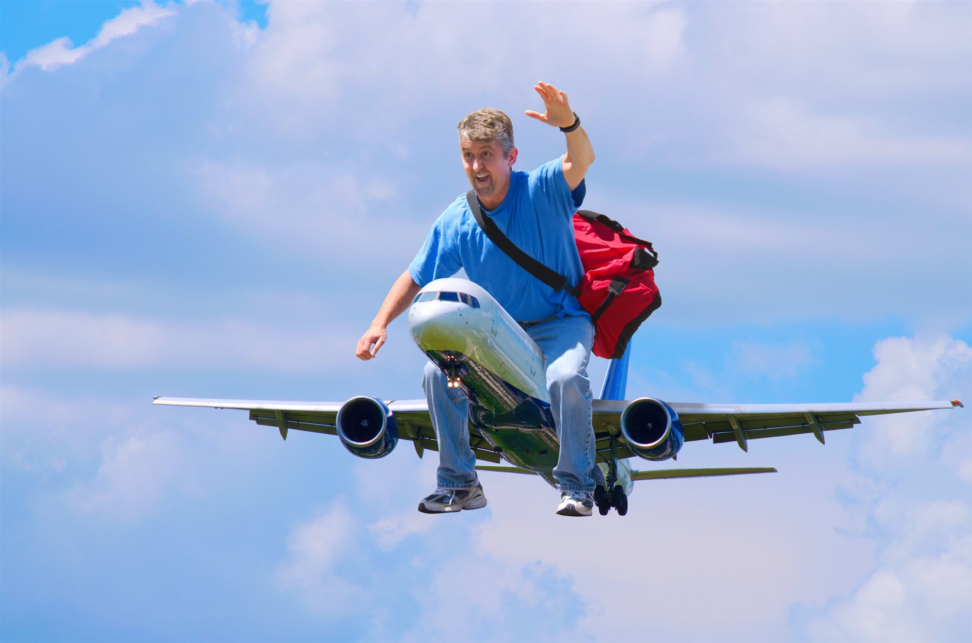 A happy traveler boarding a flight